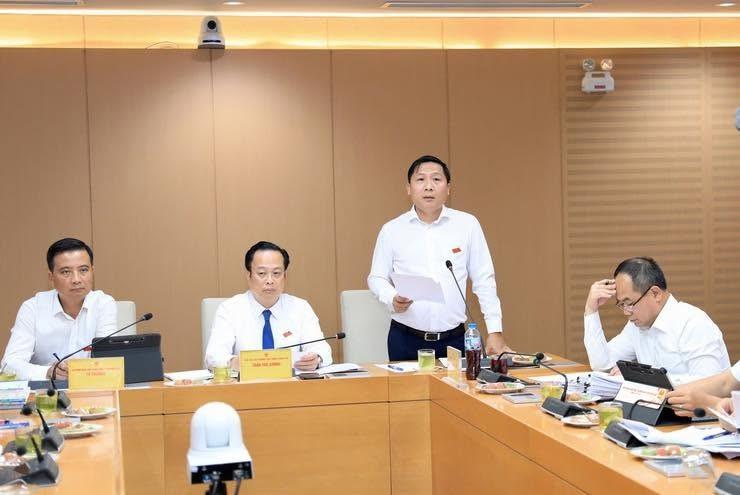 Đồng chí Nguyễn Thanh Liêm - Thành uỷ viên, Bí thư Đảng uỷ, Chủ tịch HĐND xã Quang Minh phát biểu tại kỳ họp